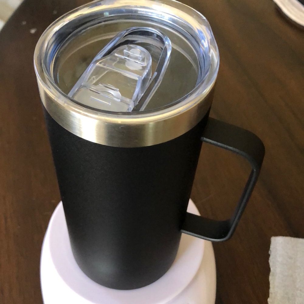 One lightweight metal tall handled mug + plastic slide close spout cover